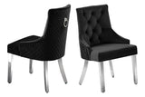 Close-up detail of Dana Black Tufted Velvet Dining Chair and marble tabletop