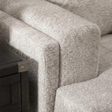 close-up detail of fabric and cushions on sand gray sectional sofa