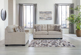 Side view of Ashley Pebble Fabric Upholstered Tufted Loveseat and Sofa Set