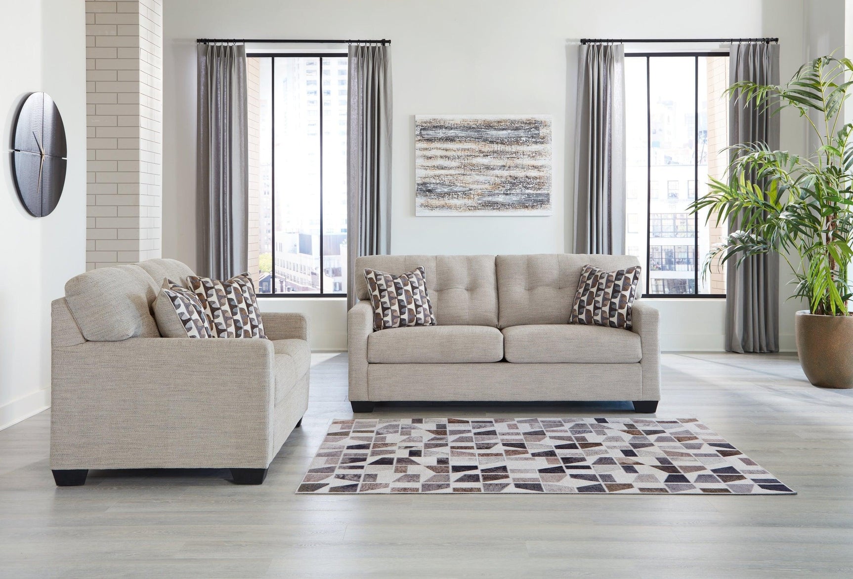 Side view of Ashley Pebble Fabric Upholstered Tufted Loveseat and Sofa Set