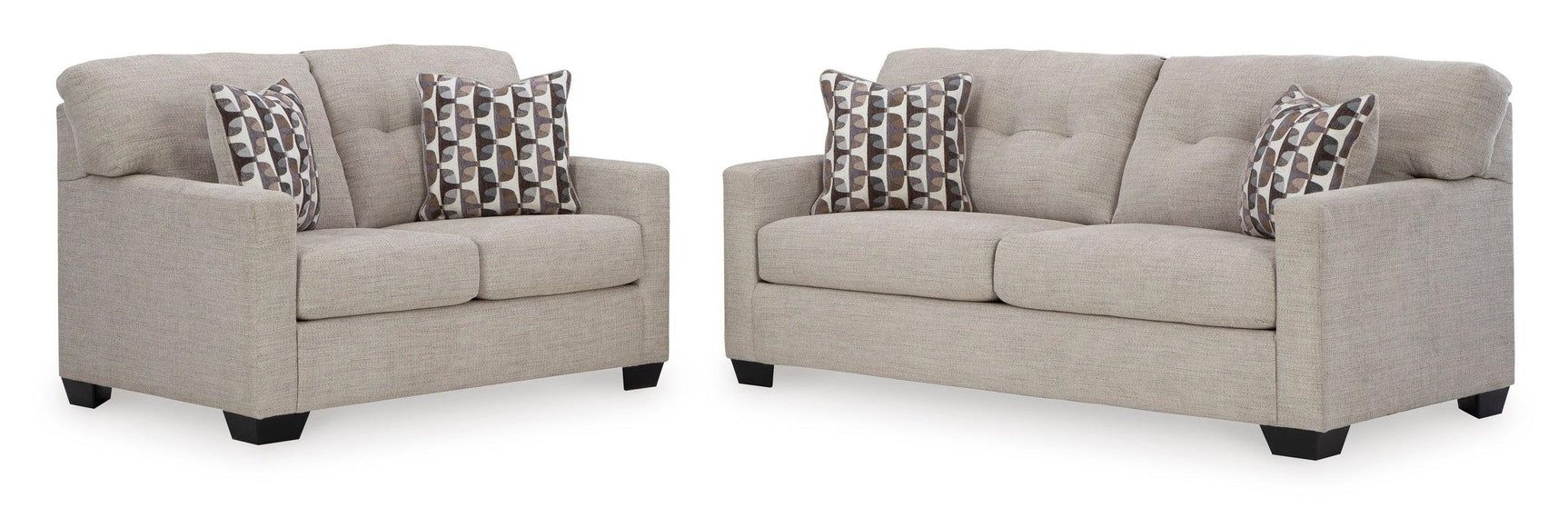 Close-up detail of tufted pebble fabric upholstery on Ashley Pebble Loveseat
