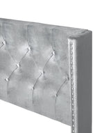 Silver velvet bed side angle showing frame detail