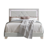 LED lighting detail on silver velvet tufted platform bed