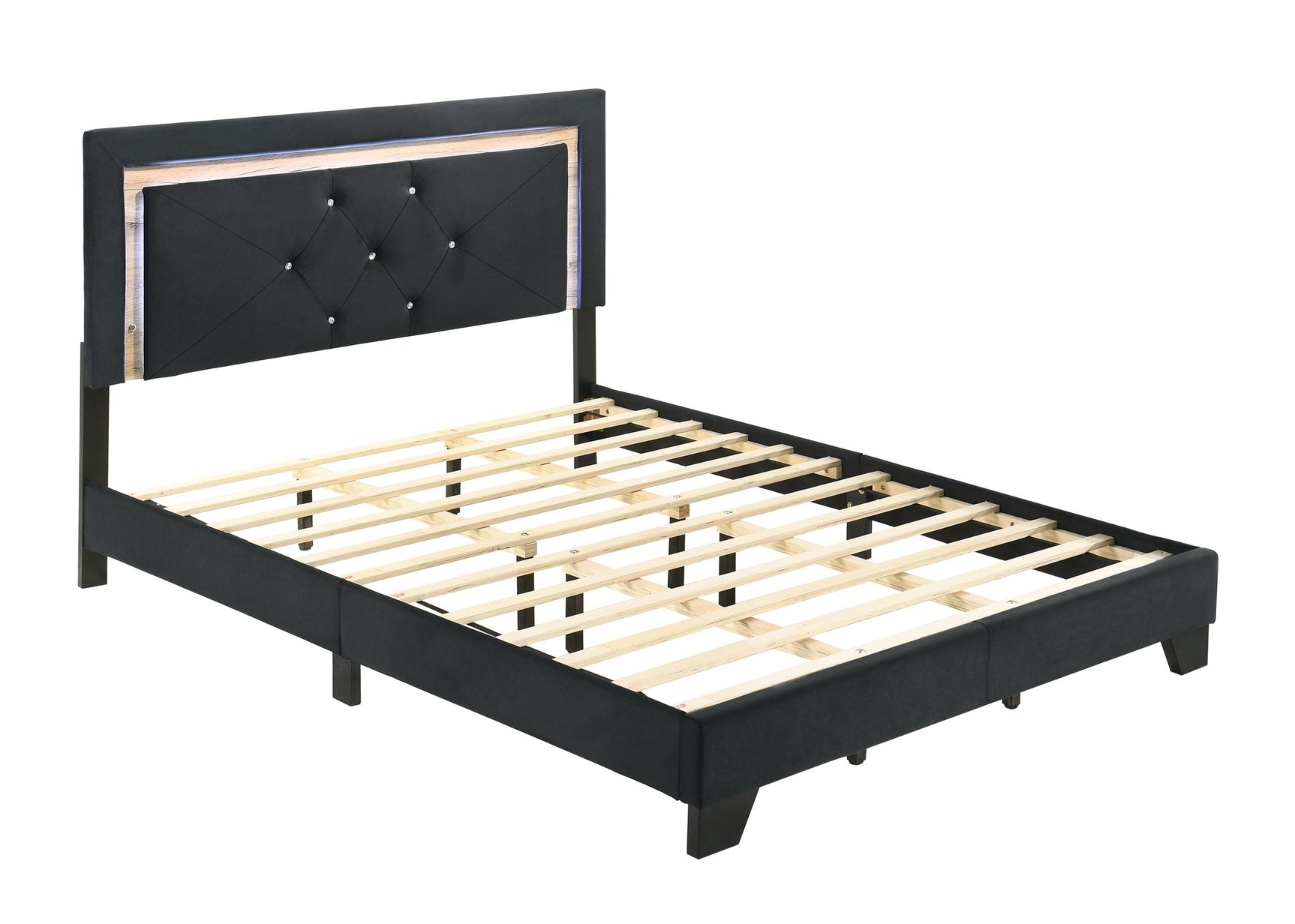 Close-up of tufted black velvet upholstery on Wally platform bed