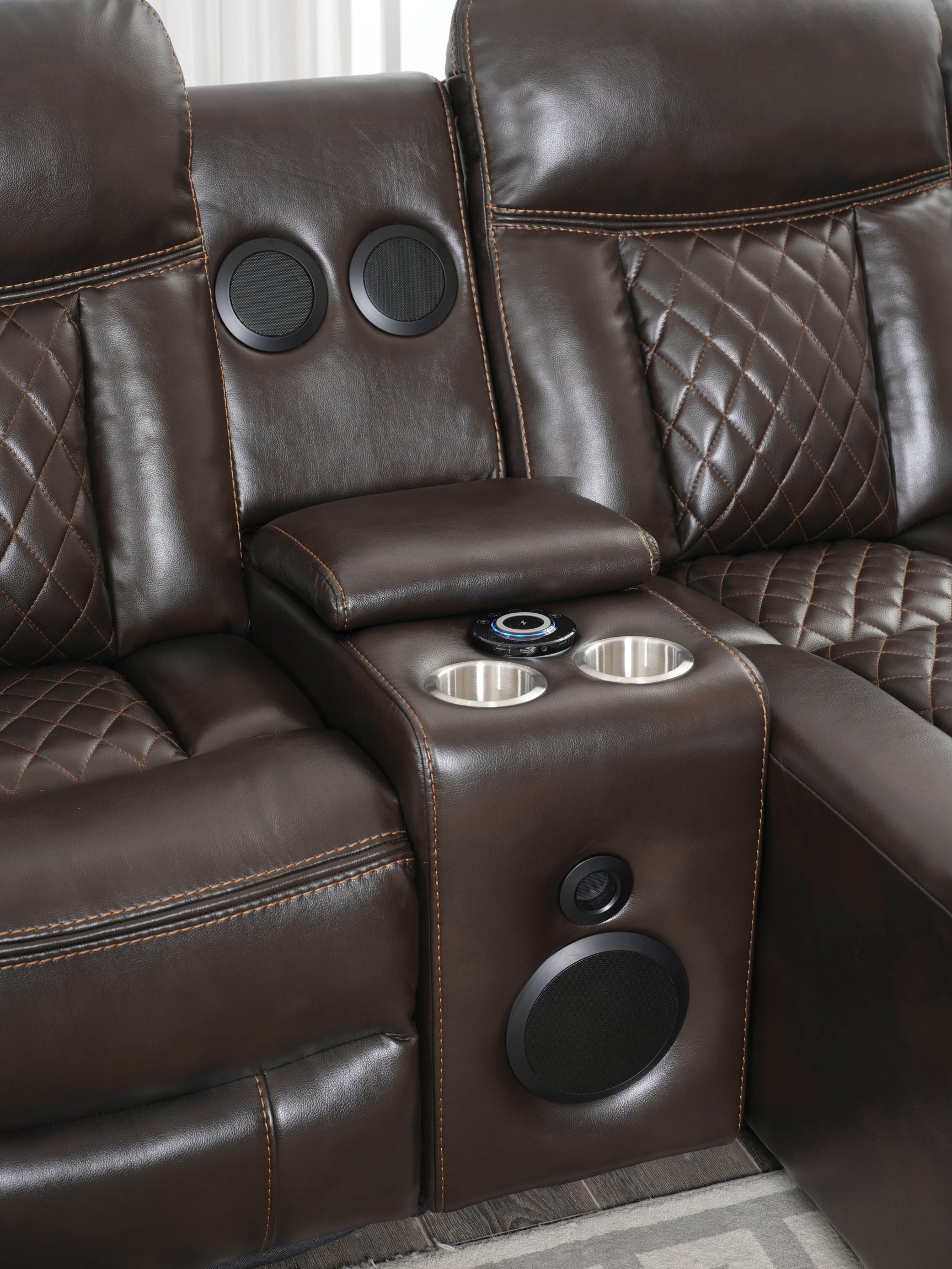 Close-up of champion sectional reclining seat and charging ports