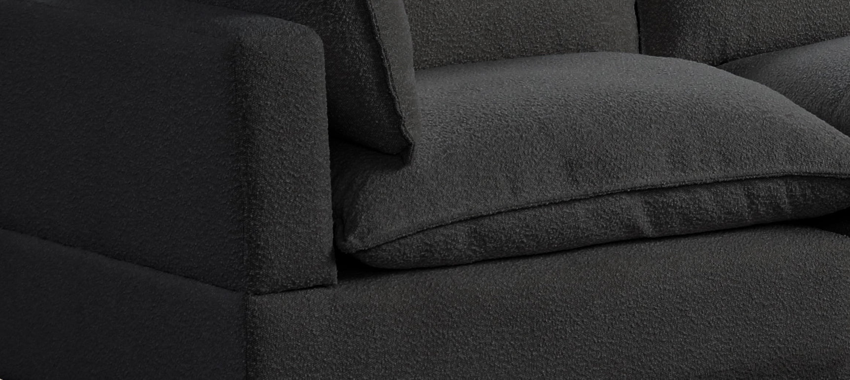 Cloud2 black modular sectional sofa in boucle fabric, side view