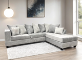 Detailed close-up of Kaf Gray sectional fabric and cushions