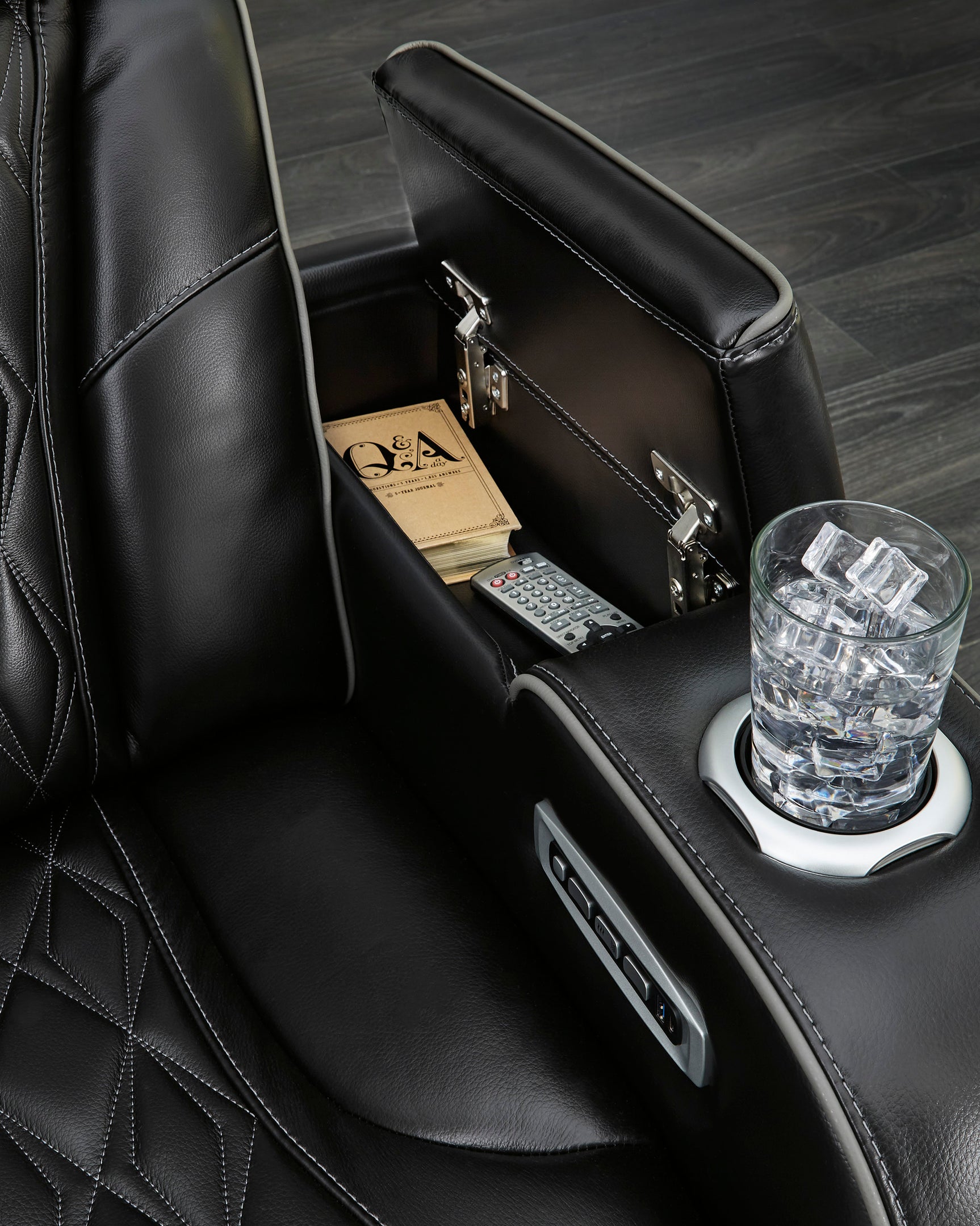Close-up of air massage controls on leather chair
