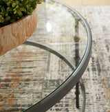 Kellyco occasional table set showing cocktail and round end table side by side