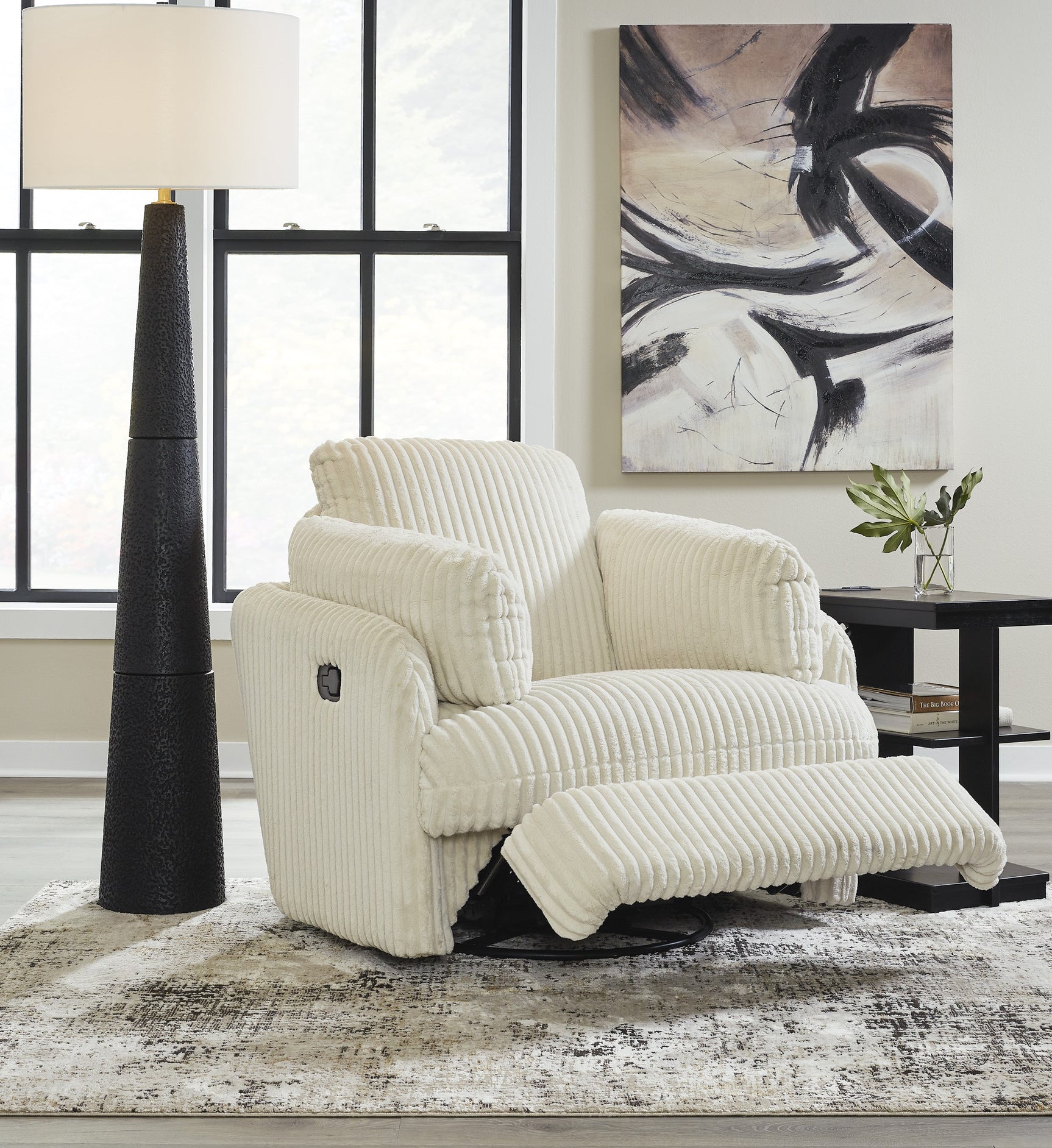 Side view of Tie-breakers Ivory Swivel Glider Recliner