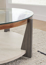 Close-up of wood-tone legs and metal frame on Frazwa Cocktail Table