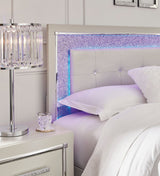 side view of Drystan Gray Panel Bedroom Set queen bed
