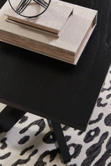 Side view of Joshyard black cocktail table
