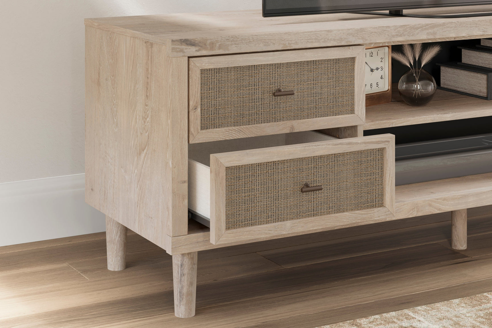 Belmar TV stand angled view highlighting two-tone woven texture