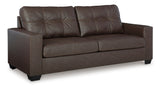Side view of Vivi Brown brown faux leather sofa and loveseat set