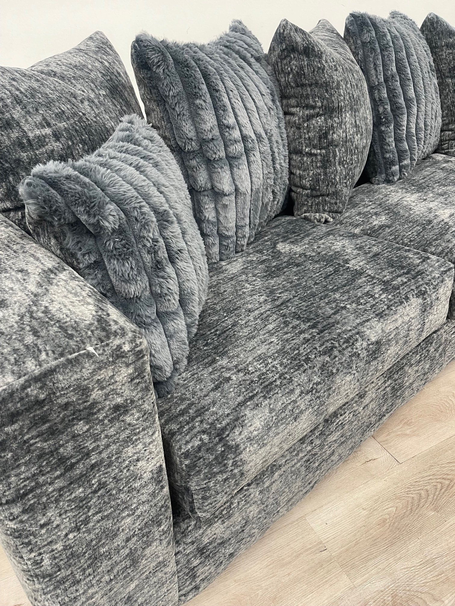 side view of Kaf Charcoal sofa and loveseat set