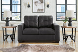 Detail view of upholstery and armrest on Vivi Carbon Sofa