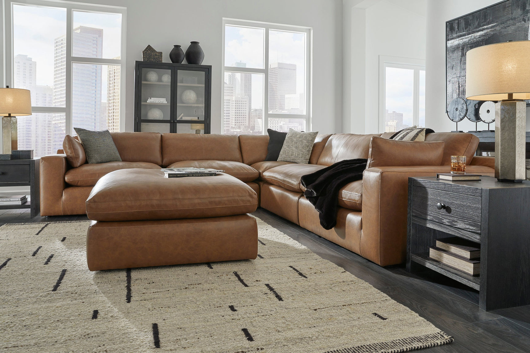 Close-up detail of Emilia Caramel genuine leather sectional sofa cushions