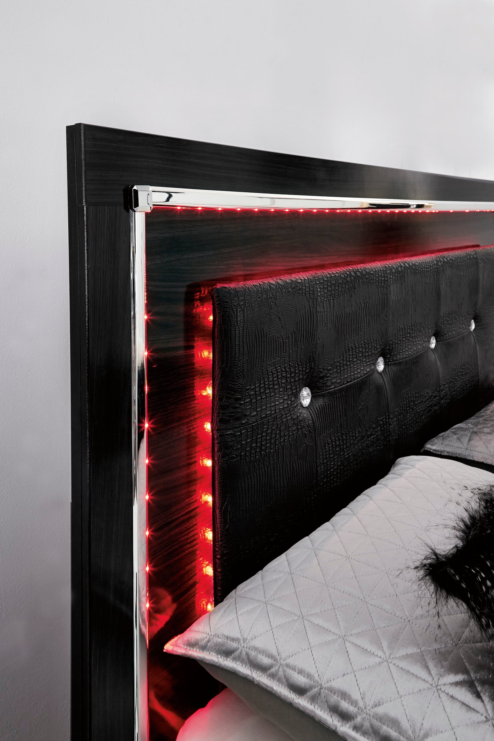 Bedroom view of Kaydell Black Upholstered Storage Panel Bedroom Set