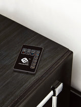 Side view of Kaydell Black Upholstered Storage Panel Bedroom Set bed