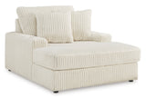 Side view of Lindyn Ivory Chaise highlighting USB charging port