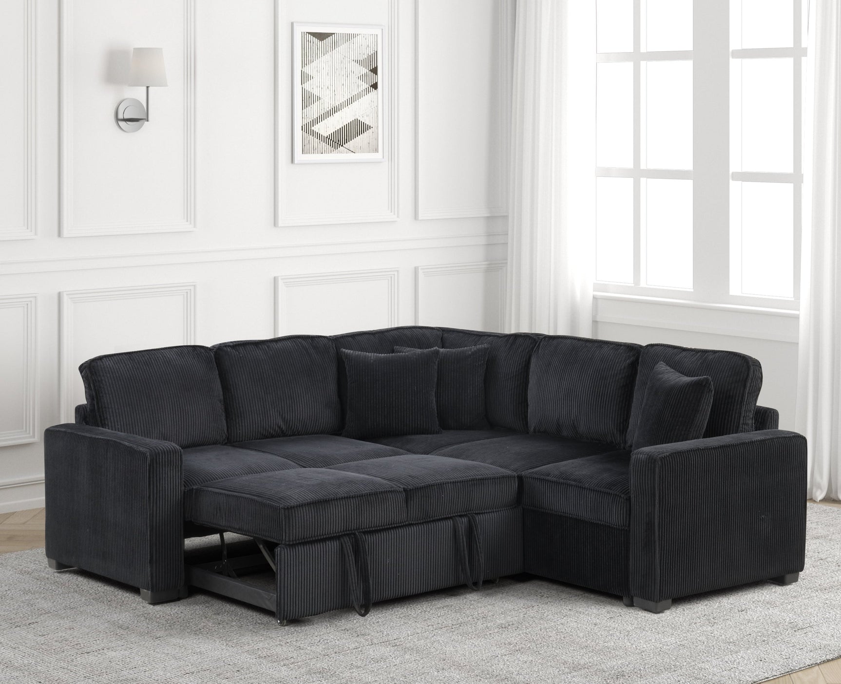 Living room view with Ariel Black Sectional Sofa