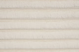 Detail of USB charging ports on Lauren beige platform bed