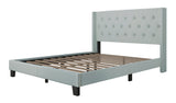 Tufted headboard detail on Hikaru teal platform bed