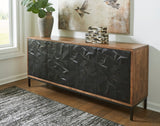 Side angle of A4000649 Accent Cabinet in black and brown finish