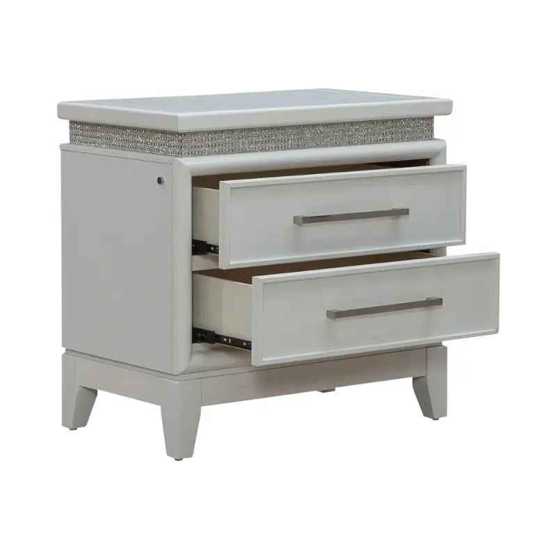 Side angle of Seveny Silver Nightstand showing its silver finish and compact design