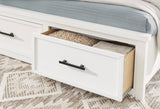 Bedroom setting with Ashbryn White Storage Platform Bedroom Set bed