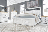 Side view of Ashbryn White Storage Platform Bedroom Set bed