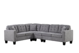 Close-up detail of gray fabric on Logan reversible sectional sofa