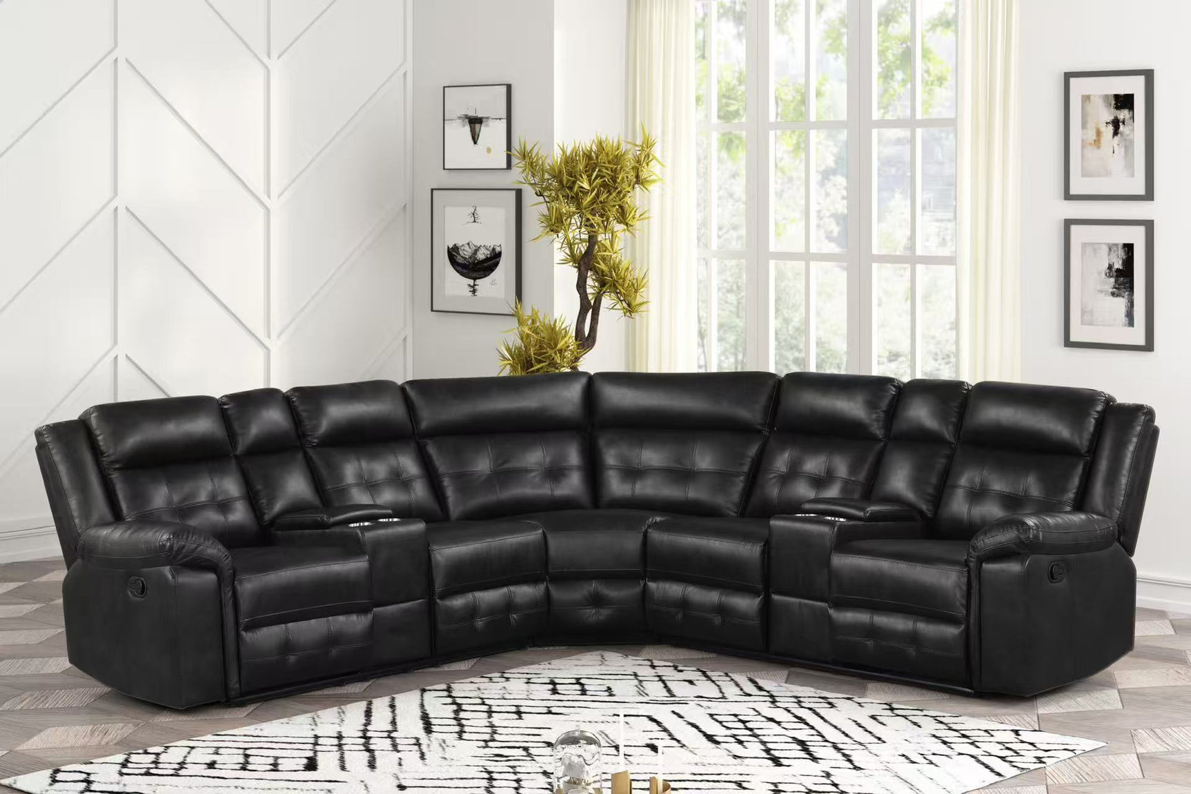 Side angle of Jacob Black black leather gel reclining sectional sofa with recliners