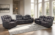 Brown leather gel reclining sofa set angled view