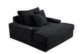 Angled view of Fortin black fur cord fabric chaise lounge