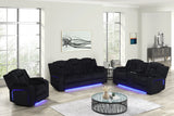 Close-up of reclining sofa arm with cup holders and LED reading light