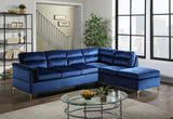Close-up detail of Vogue black velvet sectional sofa with gold metal legs upholstery and leg