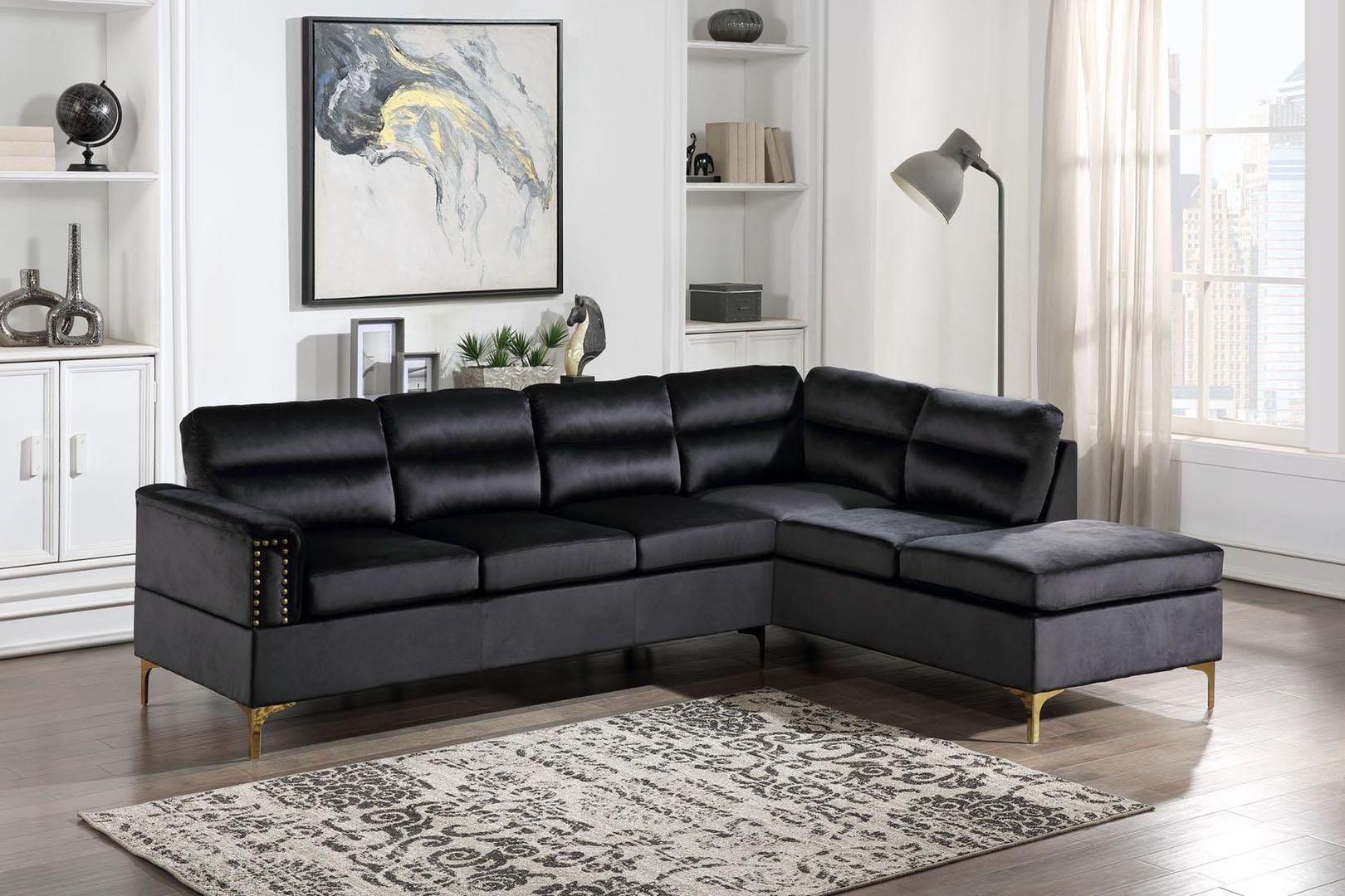Side view of Vogue Grey Velvet Sectional Sofa showing chaise and gold legs
