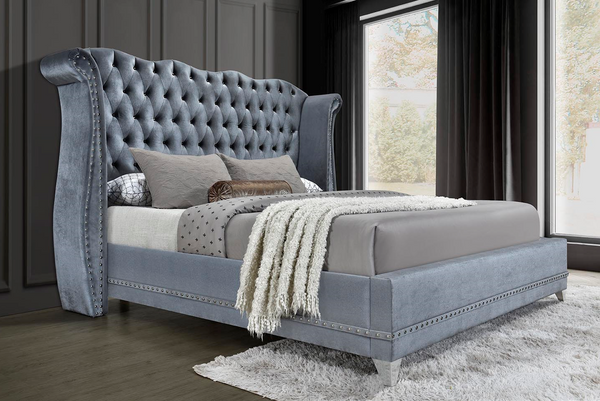 Luxor king platform bed in gray velvet with tufted diamond headboard, side angle