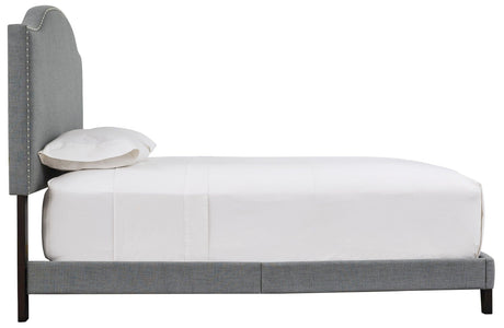 Full view of Adelloni gray platform king bed in bedroom setting