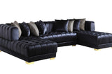 Close-up detail of black velvet fabric and gold legs on Dasha Sectional Sofa