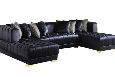 Close-up detail of black velvet fabric and gold legs on Dasha Sectional Sofa
