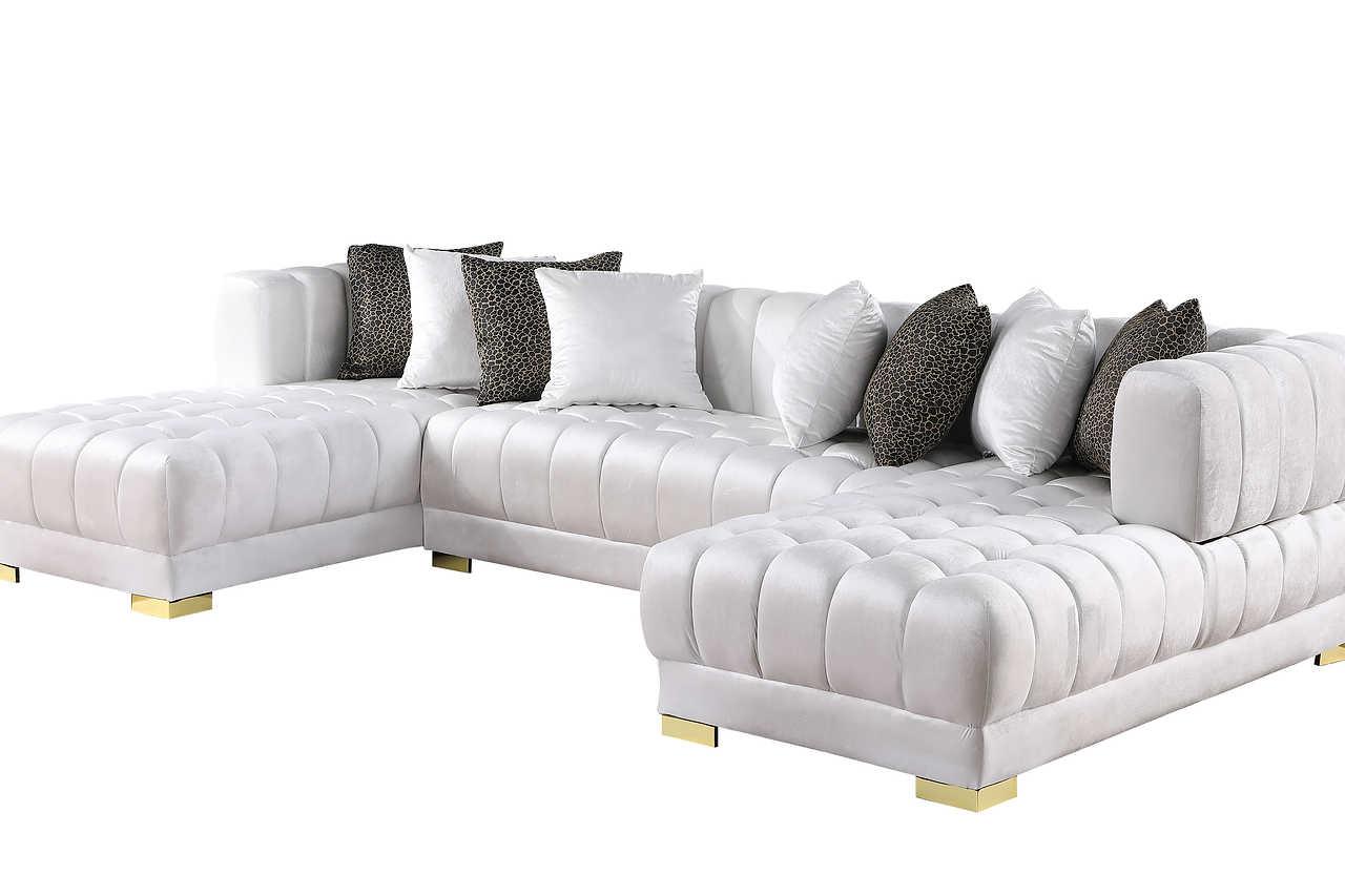 Detail view showing fabric and gold legs of Dasha White Sectional sofa