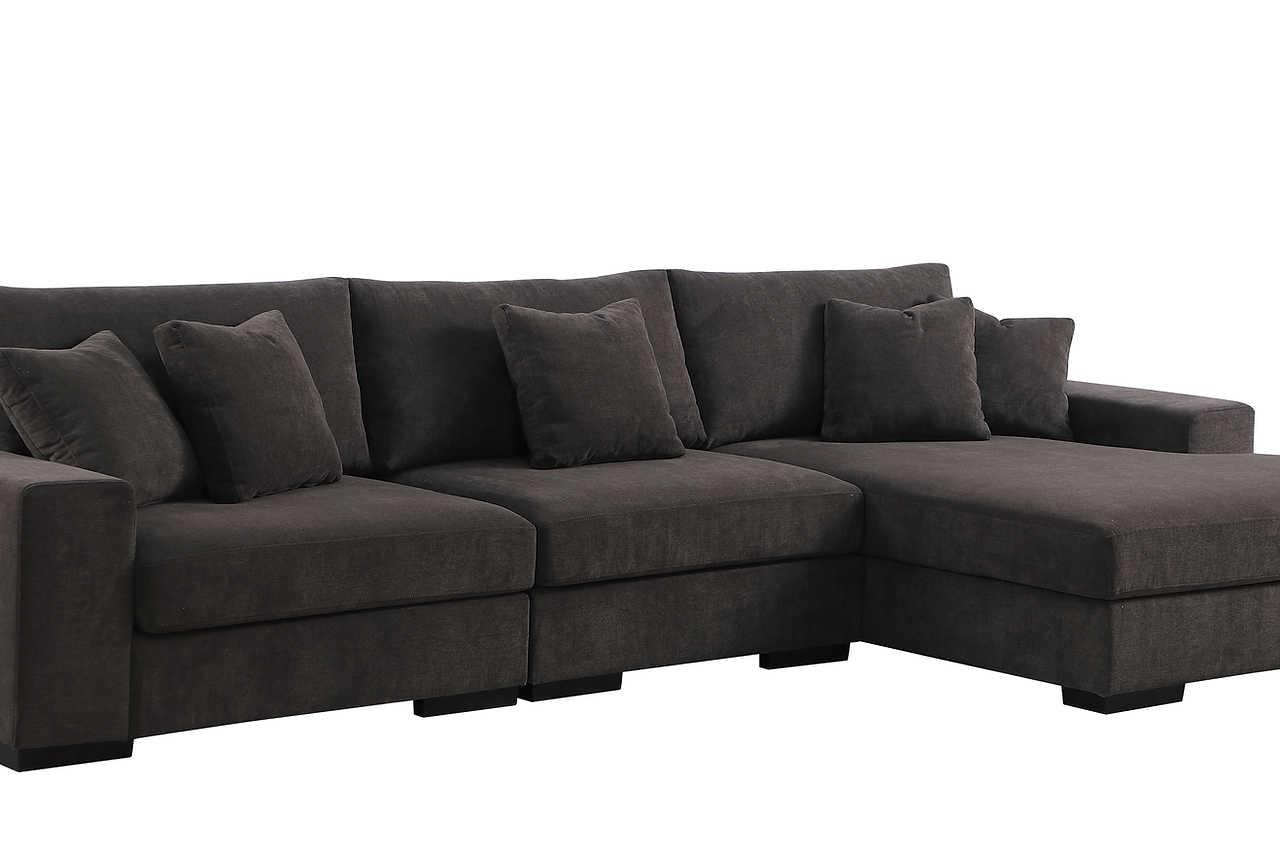 Close-up detail of Comfy Grey chenille fabric on sectional sofa