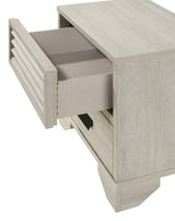 Side view of Sarter White Panel Bedroom Set bed