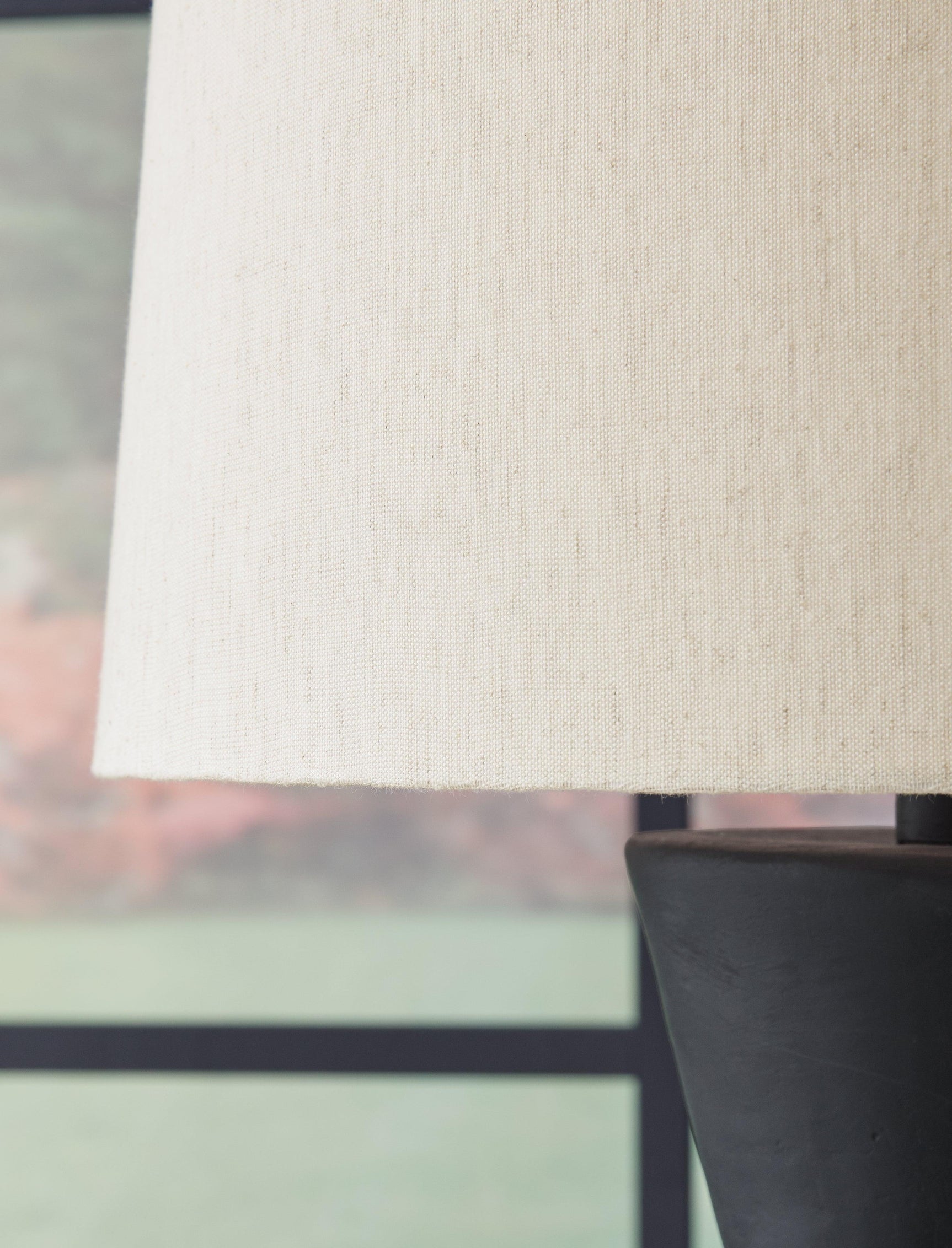 Pair of Scarbot Black Table Lamps displayed on console table