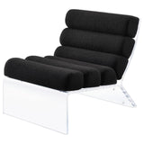 Detail of clear acrylic frame and feet on Serreta Boucle Accent Chair
