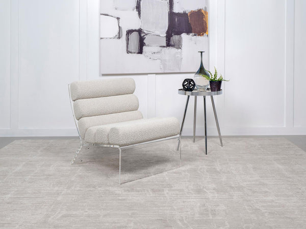 Side view of Serreta Boucle Upholstered Armless Accent Chair with clear acrylic frame in ivory