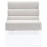 Close-up of ivory bouclé upholstery and horizontal channeling on Serreta Accent Chair